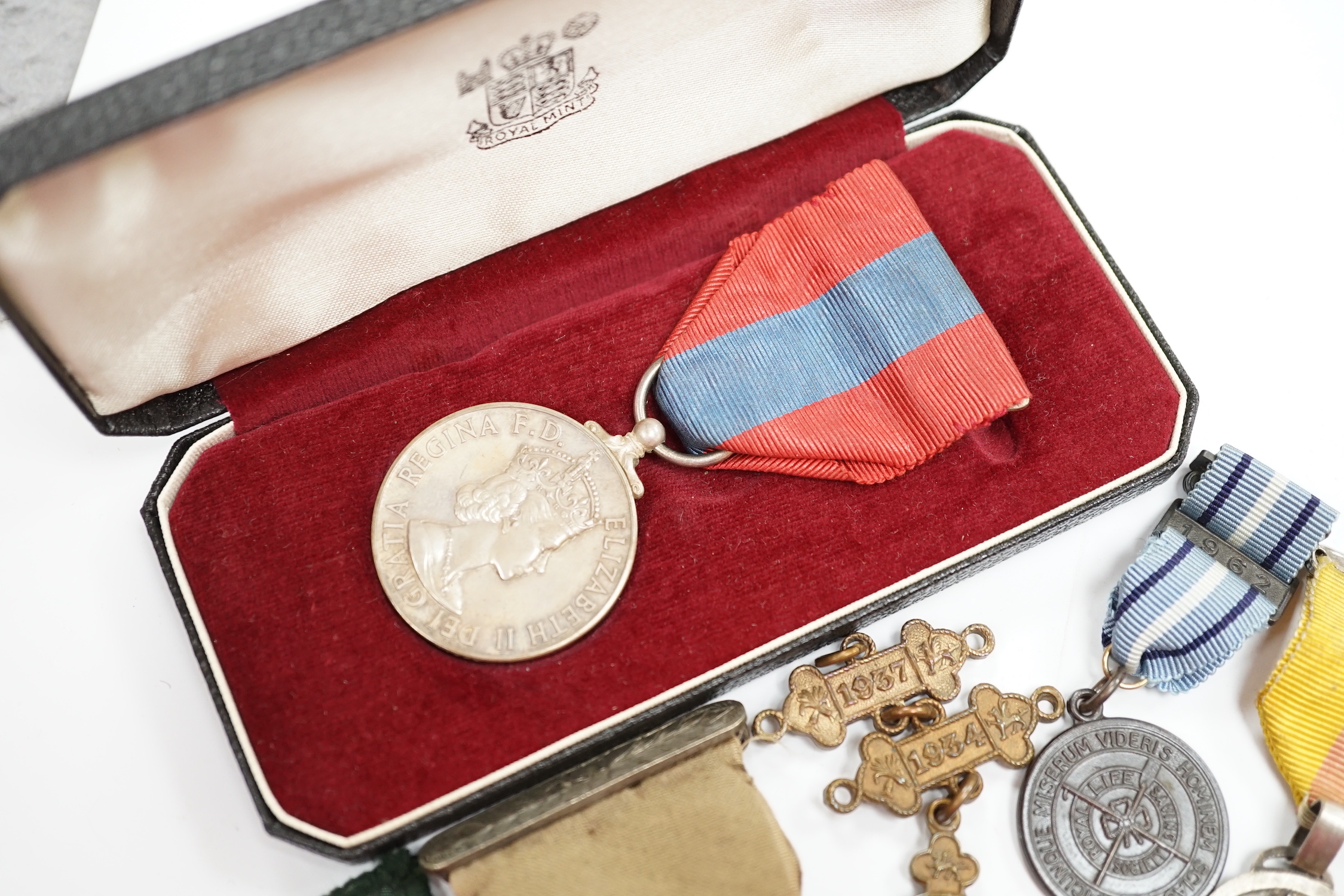 A collection of medals and badges, including eight Special Constabulary Service Medals, Fire Service Medal, a cased Police Long Service and Good Conduct Medal, masonic awards, including hallmarked silver gilt 1897 Diamon